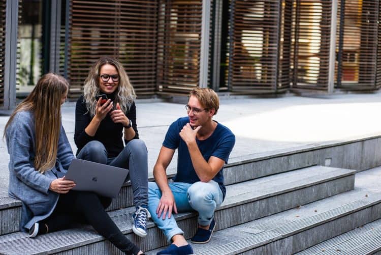 Photo by Buro Millennial: https://www.pexels.com/photo/three-persons-sitting-on-the-stairs-talking-with-each-other-1438072/