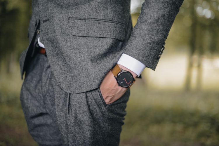 Photo by Anders Kristensen: https://www.pexels.com/photo/man-wearing-watch-with-hand-on-pocket-447570/