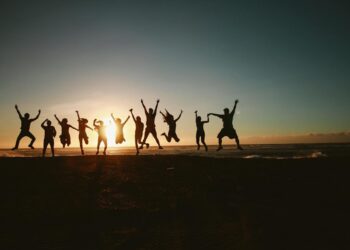 Photo by Belle Co: https://www.pexels.com/photo/silhouette-photography-of-group-of-people-jumping-during-golden-time-1000445/
