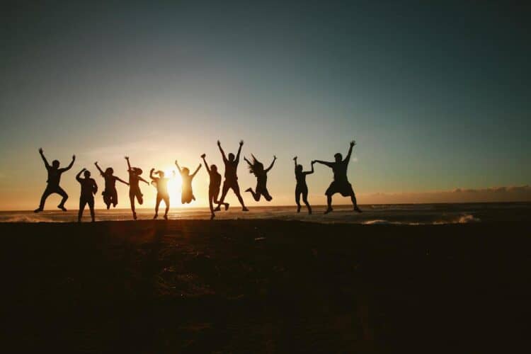 Photo by Belle Co: https://www.pexels.com/photo/silhouette-photography-of-group-of-people-jumping-during-golden-time-1000445/