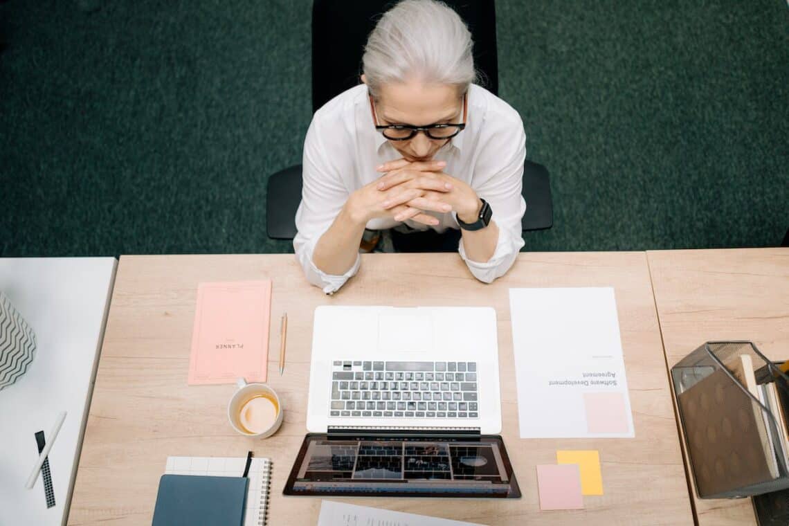 Photo by cottonbro studio: https://www.pexels.com/photo/woman-with-gray-hair-sitting-in-front-of-a-laptop-5971290/