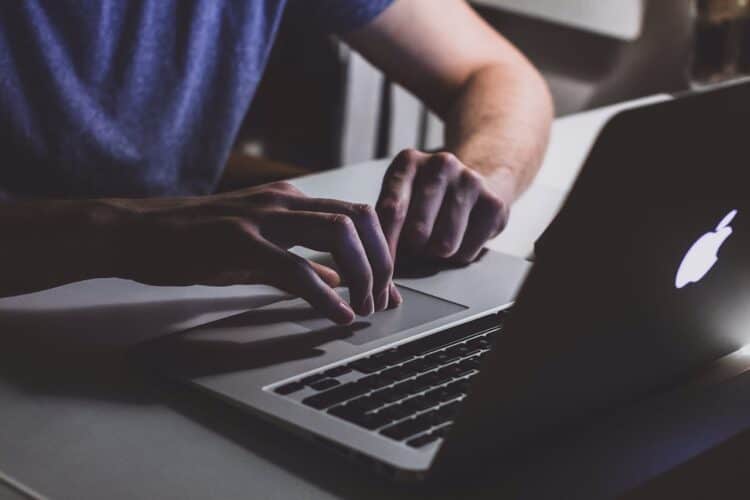 Photo by freestocks.org: https://www.pexels.com/photo/person-touching-open-macbook-on-table-839465/