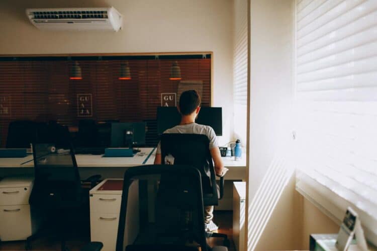 Photo by Helena Lopes: https://www.pexels.com/photo/person-in-gray-shirt-sitting-on-computer-chair-3215593/