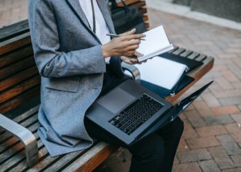 Photo by Ono  Kosuki: https://www.pexels.com/photo/crop-black-businesswoman-writing-information-in-planner-while-working-outside-6000091/