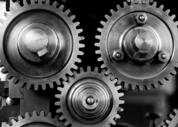 Photo by Flickr: https://www.pexels.com/photo/silver-metal-round-gears-connected-to-each-other-149387/