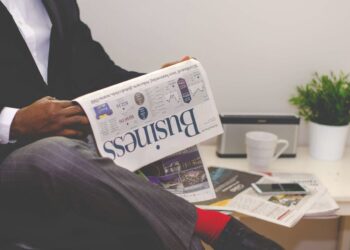 Photo by nappy: https://www.pexels.com/photo/man-reading-newspaper-while-sitting-near-table-with-smartphone-and-cup-935979/