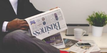 Photo by nappy: https://www.pexels.com/photo/man-reading-newspaper-while-sitting-near-table-with-smartphone-and-cup-935979/