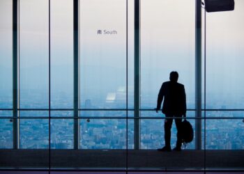 Photo by Vic Lee: https://www.pexels.com/photo/silhouette-of-businessman-in-high-rise-building-29810863/