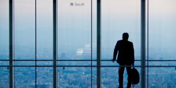 Photo by Vic Lee: https://www.pexels.com/photo/silhouette-of-businessman-in-high-rise-building-29810863/