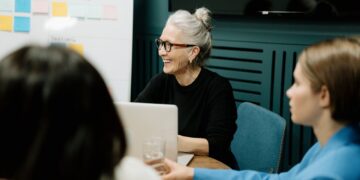 Photo by cottonbro studio: https://www.pexels.com/photo/woman-in-black-sweater-and-eyeglasses-sitting-on-chair-beside-woman-in-blue-shirt-5990271/