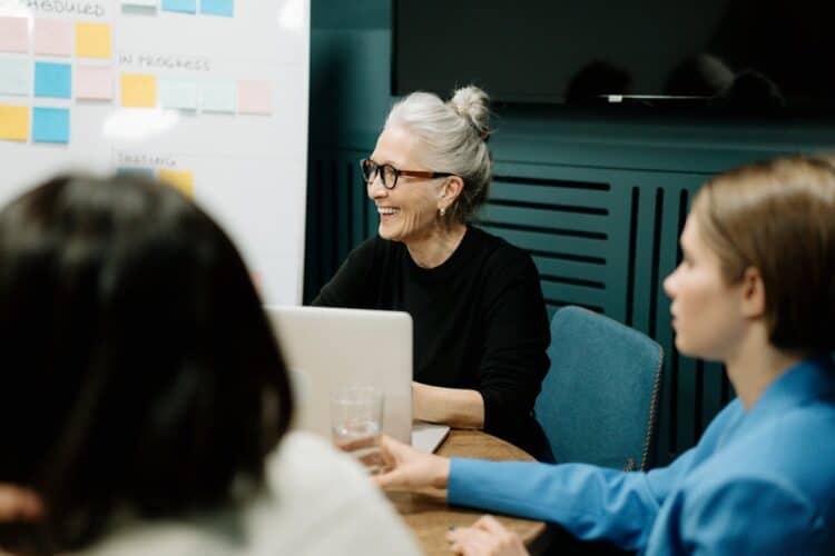 Photo by cottonbro studio: https://www.pexels.com/photo/woman-in-black-sweater-and-eyeglasses-sitting-on-chair-beside-woman-in-blue-shirt-5990271/