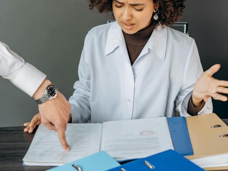 Photo by Mikhail Nilov: https://www.pexels.com/photo/young-woman-feeling-exhausted-in-white-long-sleeve-shirt-working-inside-an-office-8297420/