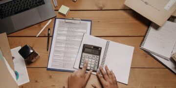 Photo by Pavel Danilyuk: https://www.pexels.com/photo/a-person-using-calculator-7654591/