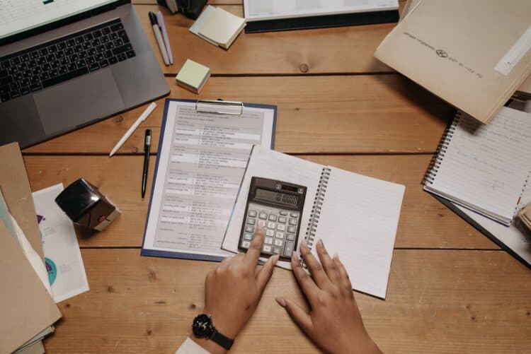 Photo by Pavel Danilyuk: https://www.pexels.com/photo/a-person-using-calculator-7654591/