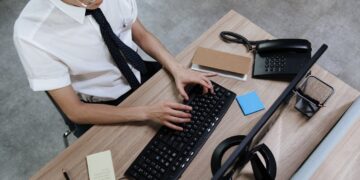 Photo by Ron Lach : https://www.pexels.com/photo/an-employee-typing-on-his-keyboard-8691820/