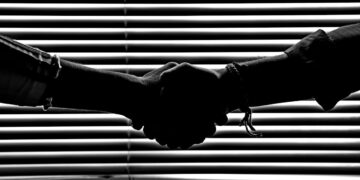 Photo by Savvas Stavrinos: https://www.pexels.com/photo/monochrome-photography-of-people-shaking-hands-814544/