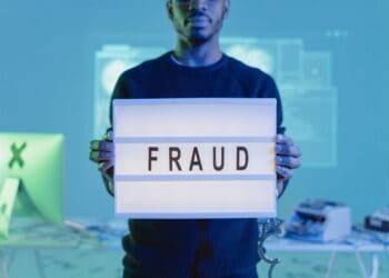 Photo by Tima Miroshnichenko: https://www.pexels.com/photo/a-man-in-black-sweater-holding-letter-board-with-fraud-text-6266311/