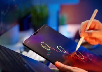 Photo by Jakub Zerdzicki: https://www.pexels.com/photo/analyzing-crypto-market-on-a-tablet-screen-32396586/