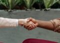 Photo by Mikhail Nilov: https://www.pexels.com/photo/close-up-shot-of-two-people-shaking-hands-7821095/