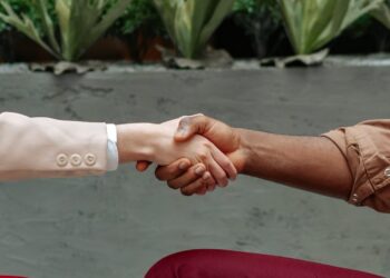 Photo by Mikhail Nilov: https://www.pexels.com/photo/close-up-shot-of-two-people-shaking-hands-7821095/
