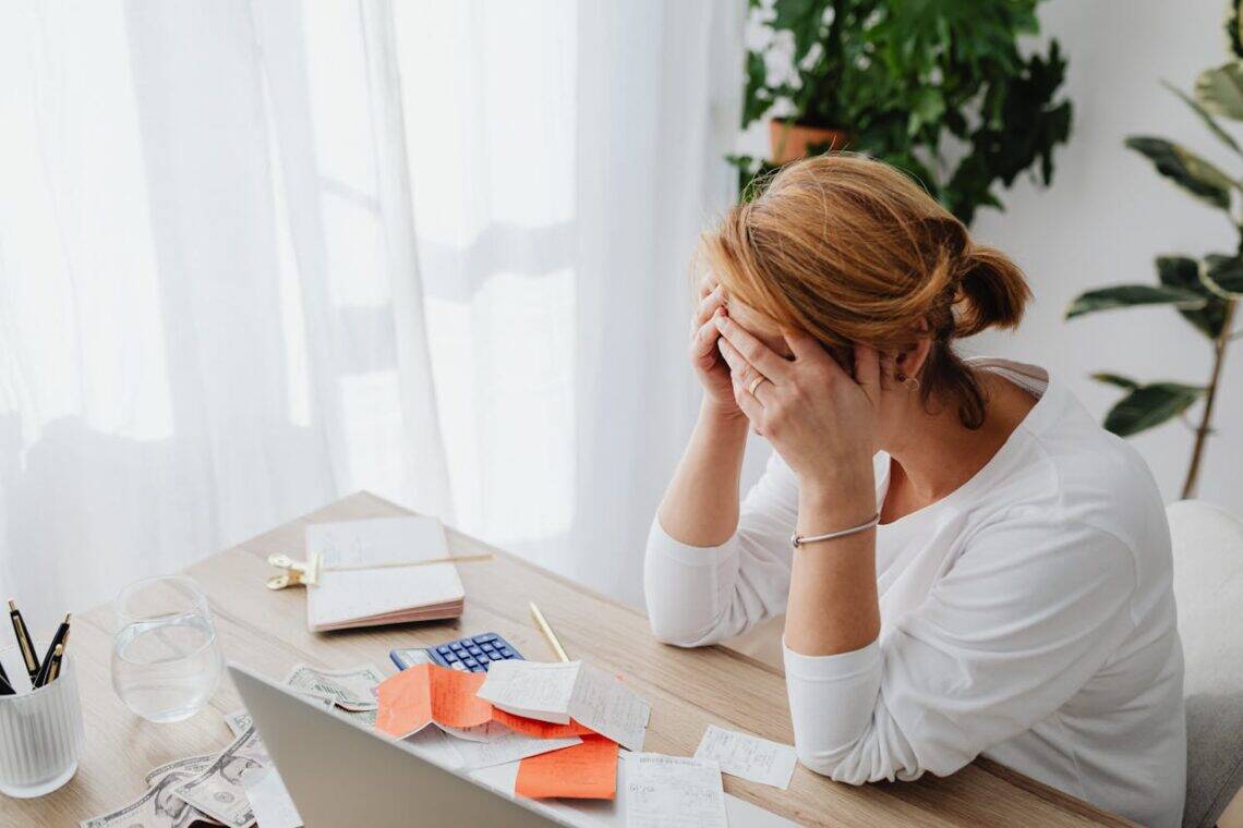 Photo by Photo By: Kaboompics.com: https://www.pexels.com/photo/woman-and-receipts-on-desk-5900131/
