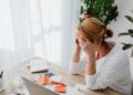 Photo by Photo By: Kaboompics.com: https://www.pexels.com/photo/woman-and-receipts-on-desk-5900131/