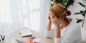 Photo by Photo By: Kaboompics.com: https://www.pexels.com/photo/woman-and-receipts-on-desk-5900131/