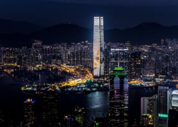 Photo by Nextvoyage: https://www.pexels.com/photo/white-and-gray-high-rise-building-at-night-1445284/