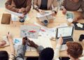 Photo by fauxels: https://www.pexels.com/photo/group-of-people-seated-around-a-table-having-a-discussion-3184311/