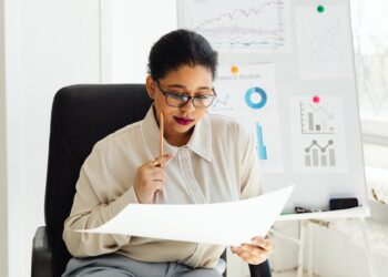 Photo by Photo By: Kaboompics.com: https://www.pexels.com/photo/a-woman-holding-a-white-paper-7876454/