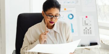 Photo by Photo By: Kaboompics.com: https://www.pexels.com/photo/a-woman-holding-a-white-paper-7876454/