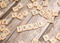 Photo by Markus Winkler: https://www.pexels.com/photo/trade-and-trade-related-words-on-wooden-table-19891035/