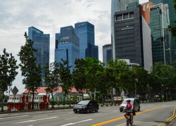 Photo by Saksham Vikram: https://www.pexels.com/photo/cityscape-of-singapore-with-skyscrapers-and-traffic-31705032/