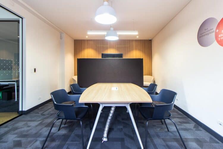 Photo by Gustavo Galeano Maz: https://www.pexels.com/photo/table-and-chairs-in-a-conference-room-8477478/