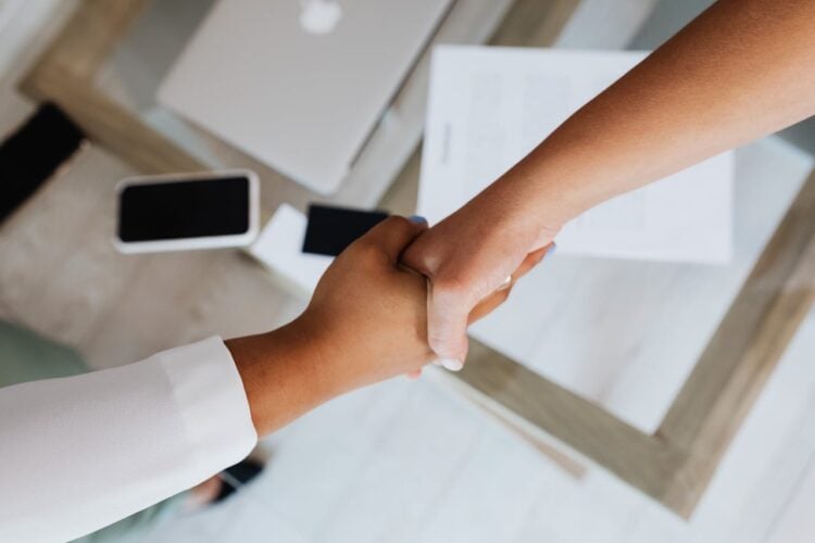 Photo by Photo By: Kaboompics.com: https://www.pexels.com/photo/two-people-doing-a-handshake-5398881/