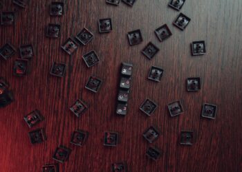 Photo by Mikhail Nilov: https://www.pexels.com/photo/keycaps-on-a-brown-surface-6964373/