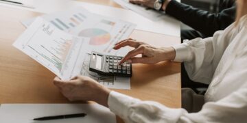 Photo by Vlada Karpovich: https://www.pexels.com/photo/a-person-using-a-calculator-7433832/