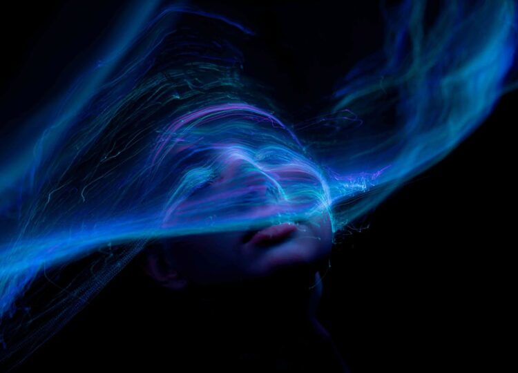 Photo by Merlin Lightpainting: https://www.pexels.com/photo/a-blue-face-glowing-11167645/