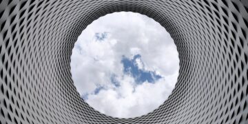 Photo by Pixabay: https://www.pexels.com/photo/low-angle-photography-of-grey-and-black-tunnel-overlooking-white-cloudy-and-blue-sky-210158/