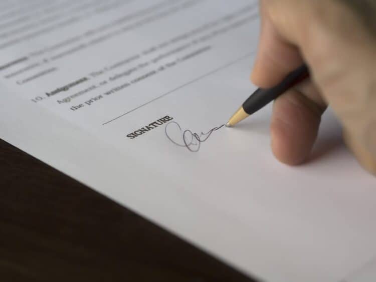 Photo by Pixabay: https://www.pexels.com/photo/selective-focus-photography-of-person-signing-on-paper-261621/